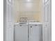 Laundry room with white Maytag washer and dryer, and white shelving at 4209 Climbing Tree Ct, Charleston, SC 29414
