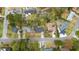 Aerial view of a neighborhood with tree-lined streets and well-maintained homes at 4343 Helene Dr, North Charleston, SC 29418