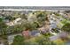 An aerial view of the neighborhood reveals lush tree coverage, waterways, and charming homes in a peaceful setting at 4343 Helene Dr, North Charleston, SC 29418