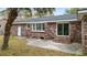 Brick home featuring a large backyard with a door and windows allowing for natural light and scenic views at 4343 Helene Dr, North Charleston, SC 29418