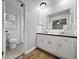 Bathroom with tile floors, vanity, and a large mirror at 4343 Helene Dr, North Charleston, SC 29418