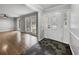 Elegant foyer featuring slate tile flooring, crown molding, and decorative front door with sidelights at 4343 Helene Dr, North Charleston, SC 29418