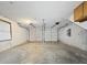 Spacious two-car garage with concrete floor and ample lighting for parking and storage at 4343 Helene Dr, North Charleston, SC 29418