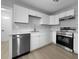 Bright, updated kitchen featuring white cabinets, stainless steel appliances, and modern fixtures at 4343 Helene Dr, North Charleston, SC 29418