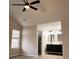 This bedroom features a vaulted ceiling with fan, a window and an ensuite bathroom with double vanity at 4414 Rice Mill Dr, North Charleston, SC 29420