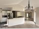 Stylish kitchen open to the living area, featuring granite counters and modern appliances at 4414 Rice Mill Dr, North Charleston, SC 29420