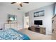 Comfortable bedroom featuring neutral walls, plush carpet, and a stylish ceiling fan, offering a relaxing atmosphere at 477 Spanish Wells Rd, Summerville, SC 29486