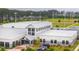 An aerial view of the Cane Bay Gathering YMCA featuring a large modern facility with sports fields and ample parking at 477 Spanish Wells Rd, Summerville, SC 29486