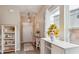 Bright entryway with wood-look floors, leading to a bright window with natural light at 477 Spanish Wells Rd, Summerville, SC 29486