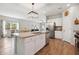 Open concept kitchen featuring stainless appliances, granite countertops, and sightlines to living area at 477 Spanish Wells Rd, Summerville, SC 29486