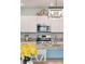 Kitchen featuring stainless appliances, granite countertops, and decorative accents on the cabinets at 477 Spanish Wells Rd, Summerville, SC 29486