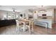 The open-concept design features dining and living spaces with ample room to move around at 477 Spanish Wells Rd, Summerville, SC 29486