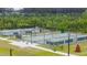 Aerial view of well-maintained community tennis courts, perfect for recreational play and staying active at 477 Spanish Wells Rd, Summerville, SC 29486