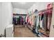 Spacious walk-in closet with ample shelving and storage for clothes and accessories at 477 Spanish Wells Rd, Summerville, SC 29486