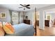 Bedroom features a four-poster bed and ensuite bathroom, offering convenience and privacy at 5037 Alpha St, North Charleston, SC 29405