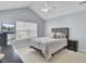 Bedroom featuring neutral tones, with a ceiling fan and television at 5223 Fernland Way, Charleston, SC 29420