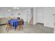 Bright dining room featuring hardwood floors, and open plan view of stairs to second floor and an open plan living space at 5223 Fernland Way, Charleston, SC 29420