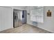 Modern kitchen featuring stainless steel appliances, gray cabinets and lots of natural light from a large window at 5223 Fernland Way, Charleston, SC 29420