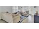 Bright living room with comfortable seating, a patterned rug, and French doors leading to outdoor space at 5223 Fernland Way, Charleston, SC 29420