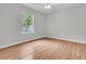 Bright, spacious bedroom with hardwood floors and natural light from the window at 543 Castle Hall Rd, Mount Pleasant, SC 29464