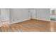 Spacious, light-filled bedroom featuring hardwood floors and an ensuite bathroom at 543 Castle Hall Rd, Mount Pleasant, SC 29464