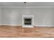 Spacious living room with hardwood floors and a cozy fireplace at 543 Castle Hall Rd, Mount Pleasant, SC 29464