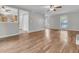 Spacious living room with hardwood floors and view into the kitchen area at 543 Castle Hall Rd, Mount Pleasant, SC 29464