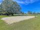 Outdoor sand volleyball court with a net set up and green grass surrounds at 543 Castle Hall Rd, Mount Pleasant, SC 29464