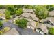 Aerial view of townhomes surrounded by lush greenery and mature trees in a neighborhood setting at 5514 Colonial Chatsworth Cir, North Charleston, SC 29418