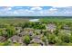 Aerial view of a community surrounded by a landscape of trees and water views, showcasing serene living at 5514 Colonial Chatsworth Cir, North Charleston, SC 29418