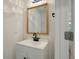 Bathroom featuring a vanity with a framed mirror and matte black faucet at 5514 Colonial Chatsworth Cir, North Charleston, SC 29418