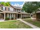 Charming townhome exterior with manicured lawn and inviting entrance at 5514 Colonial Chatsworth Cir, North Charleston, SC 29418