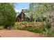Outdoor pavilion near a small pond, offering a tranquil setting surrounded by nature at 5514 Colonial Chatsworth Cir, North Charleston, SC 29418