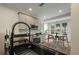 Modern kitchen featuring sleek countertops, stainless steel appliances, and an eat-in dining area at 5514 Colonial Chatsworth Cir, North Charleston, SC 29418