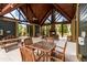 Charming community lounge area with fireplace and lake view, great for gatherings and relaxation at 5514 Colonial Chatsworth Cir, North Charleston, SC 29418