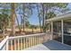 Relaxing back deck offering serene golf course views and a peaceful outdoor space for leisure and entertainment at 60 Rice Ln, Edisto Beach, SC 29438