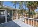 Spacious deck that looks out onto golf course, perfect for enjoying the beauty of the outdoors from home at 60 Rice Ln, Edisto Beach, SC 29438