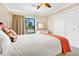 Bedroom featuring private balcony, providing a tranquil retreat with natural light at 60 Rice Ln, Edisto Beach, SC 29438