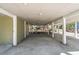 Spacious carport area with plenty of room to store a vehicle and set up a relaxing backyard area at 60 Rice Ln, Edisto Beach, SC 29438