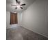 Bedroom features include neutral walls, carpet, and a fan light fixture, ideal for a comfortable space at 619 Hilchot Dr, Summerville, SC 29486