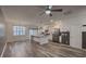 Bright kitchen features stainless appliances, a spacious island and modern pendant lighting at 619 Hilchot Dr, Summerville, SC 29486