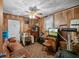 Paneled spare room featuring a sofa, ceiling fan, and assorted furniture at 6305 Brandt St, North Charleston, SC 29406
