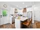 Modern kitchen featuring white cabinets, stainless steel appliances, and a stylish island at 6373 Farm House Rd, Ravenel, SC 29470