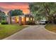 Charming brick home with a spacious driveway and mature trees at 757 Longfellow Rd, Charleston, SC 29407