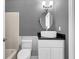 Modern bathroom featuring stylish vessel sink, white cabinets, and walk-in shower at 7911 Windfern Ct # 1502, North Charleston, SC 29418