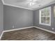 Bedroom showcasing a ceiling fan, and natural light from the window at 7911 Windfern Ct # 1502, North Charleston, SC 29418