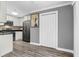Clean kitchen featuring white cabinets, granite countertops, and stainless steel appliances at 7911 Windfern Ct # 1502, North Charleston, SC 29418