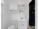 Bathroom featuring a classic vanity, mirror, and shower at 809 N Magnolia St, Summerville, SC 29483