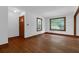 Cozy living area with hardwood floors and fresh white walls, creating a welcoming and inviting atmosphere at 809 N Magnolia St, Summerville, SC 29483