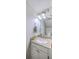 Bathroom featuring vanity with mirror and overhead lighting and a towel rack at 811 Reserve Way, Summerville, SC 29485